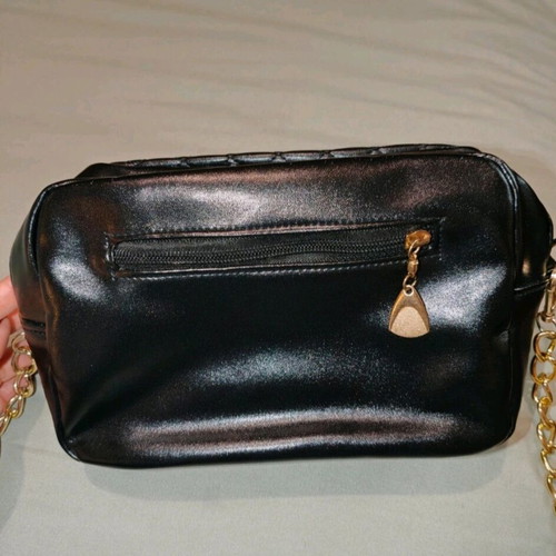 Women's crossbody bag like new, black with gold details
