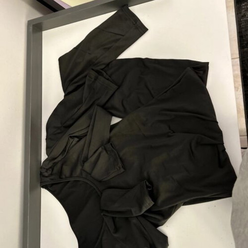 Black one-piece jumpsuit new, size M