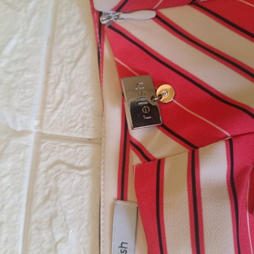 Relish skirt size 42 like new, orange with decorative zippers