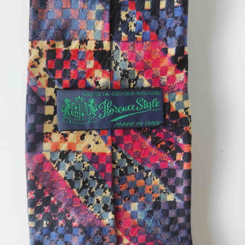 Vintage silk tie like new with geometric multicolor pattern