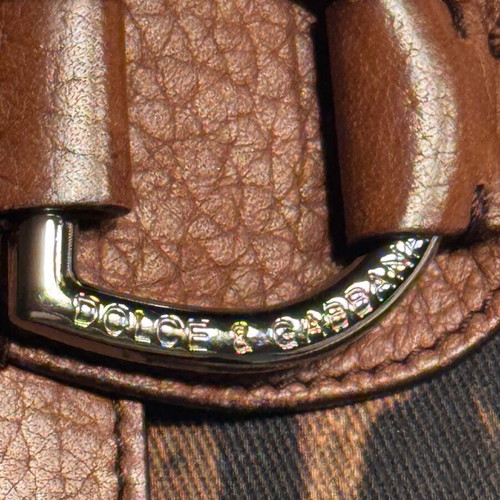 Dolce & Gabbana wallet used with leopard pattern and brown leather