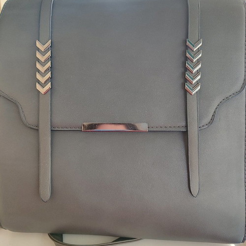 Backpack bag grey used with silver details