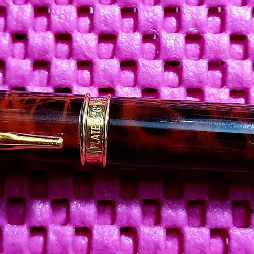 Caran d'Ache Genève pen new with brown marble lacquer and gold accents