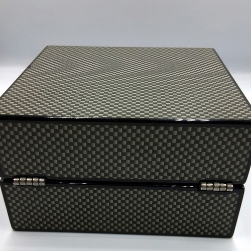 Cigar accessory set box like new with carbon fiber finish