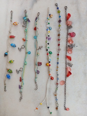 Ankle bracelets used, set of six colorful, cord and chain