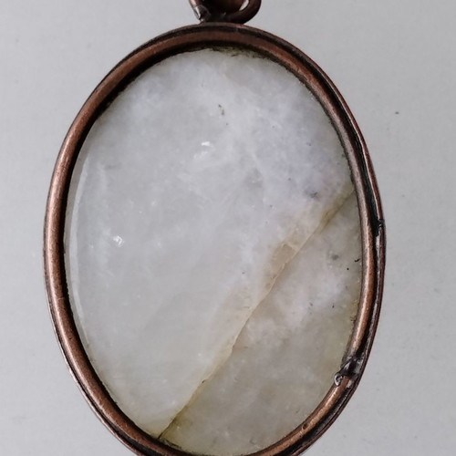 Metal necklace with oval moonstone semi-precious stone used