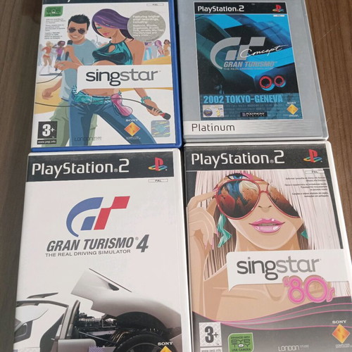 Sony PlayStation 2 used with 4 microphones and 4 games