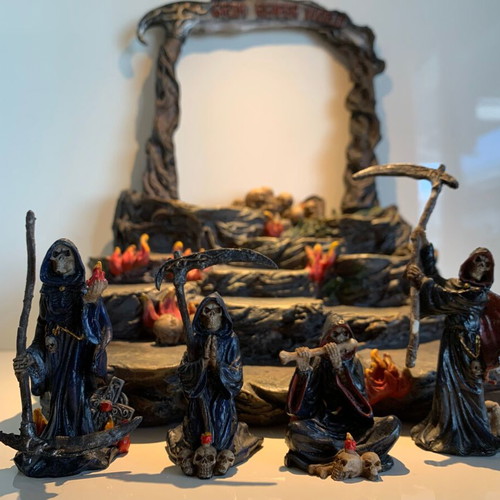 Gothic decorative resin base with 4 used Grim Reaper figures