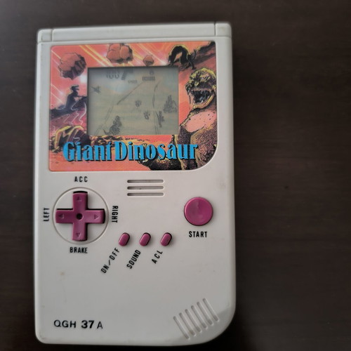 Vintage LCD handheld game "Giant Dinosaur" QGH 37 A (90s retro)