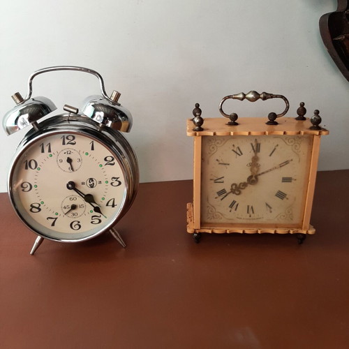 Set of two vintage wind-up clocks used, circa 1950