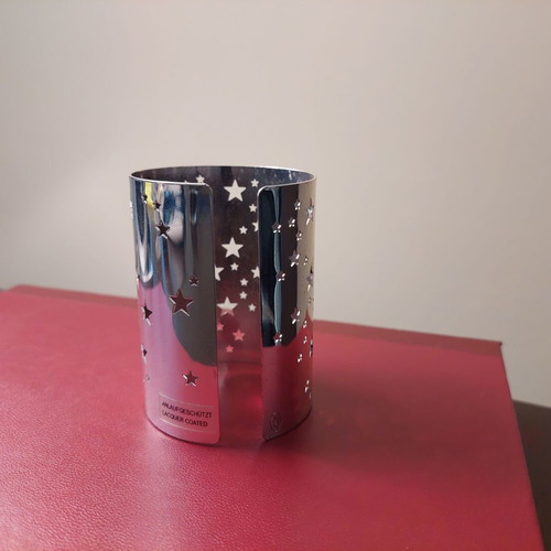 Vintage tealight holder with lacquer coated and new candle