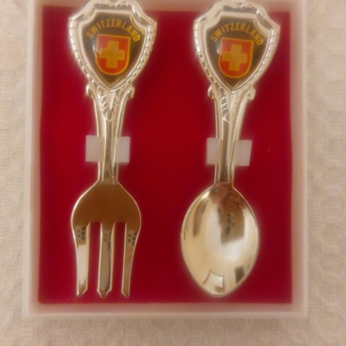 Collectible Switzerland spoon and fork set like new, in box