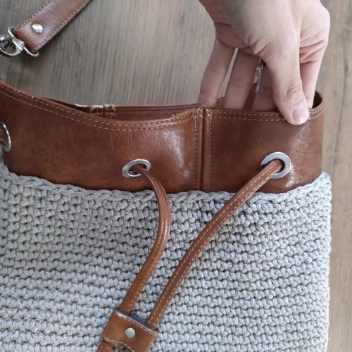 Handmade bucket bag used with brown leather details