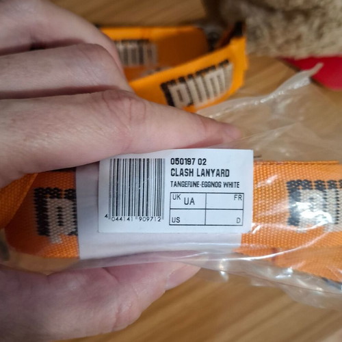Puma keychains new, set of 5, orange and black