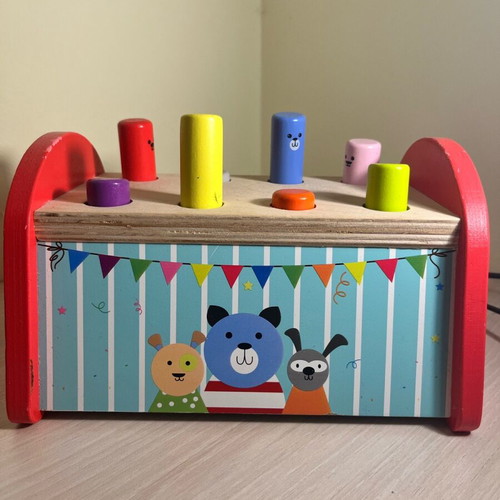 Wooden toy like new with sliding sticks