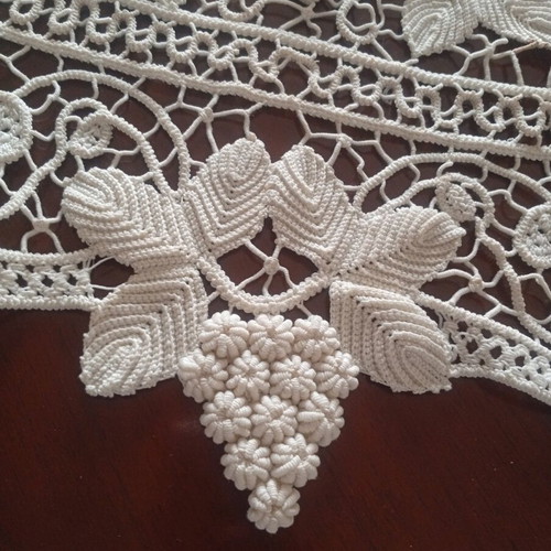 Antique handmade crochet table linen with grape cluster design used