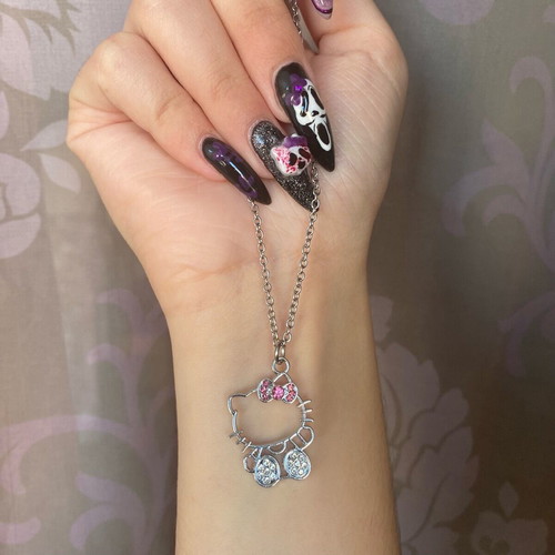 Hello Kitty necklace new with steel chain and metal pendant pink silver