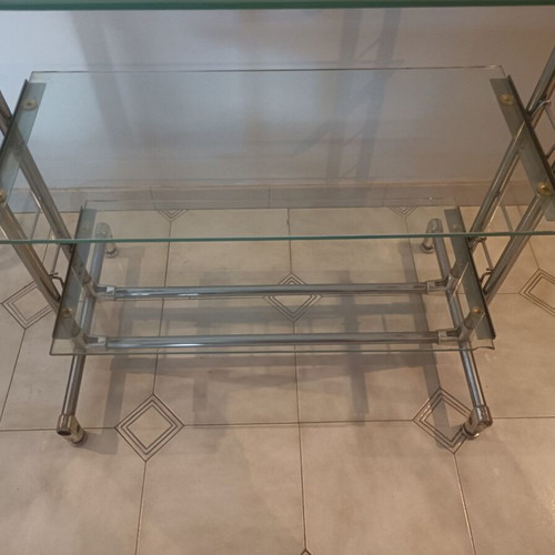 Glass professional shelving unit used with sandblasted glass and nickel frame