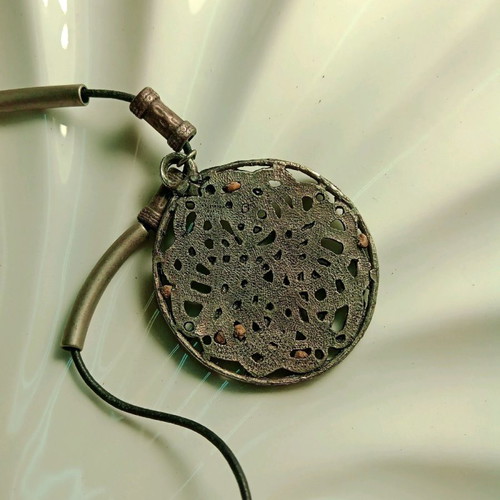Pendant Celtic design like new with black adjustable leather strap