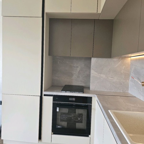 L-shaped kitchen new MDF and chipboard cabinets with Latte color