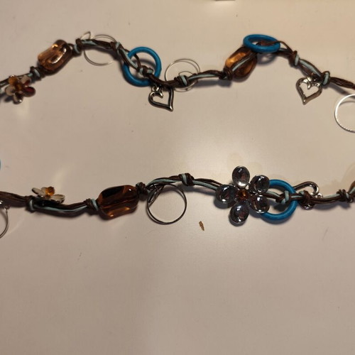 Women's necklace with cords, metal and beads like new