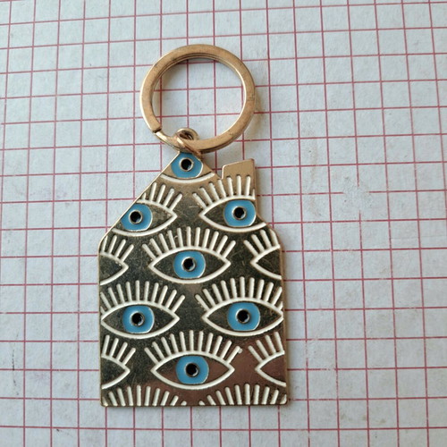 Keychain charm "mati" like new, metal with blue eyes