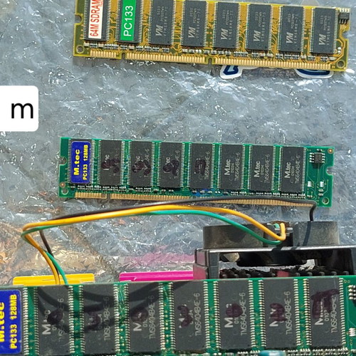 Vindage motherboard with Celeron processor and 3 memories
