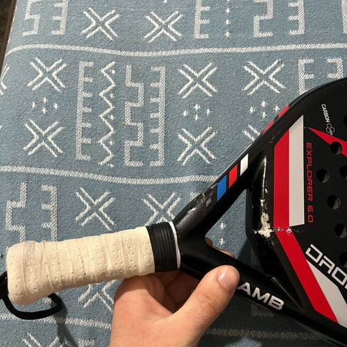 Padel racket Drop Shot used with signs of wear