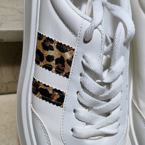 Sneakers white Tsoukalas Shoes like new, size 39 with animal print details