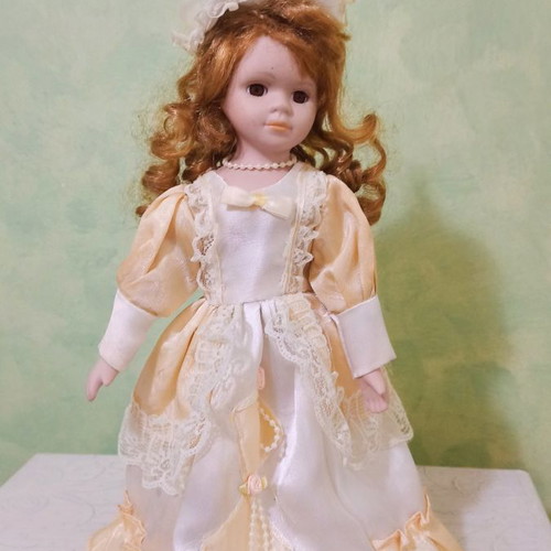 Vintage porcelain doll used