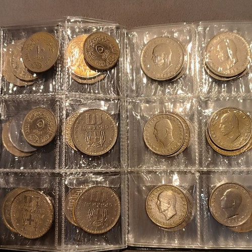 Album of 60 collectible coins