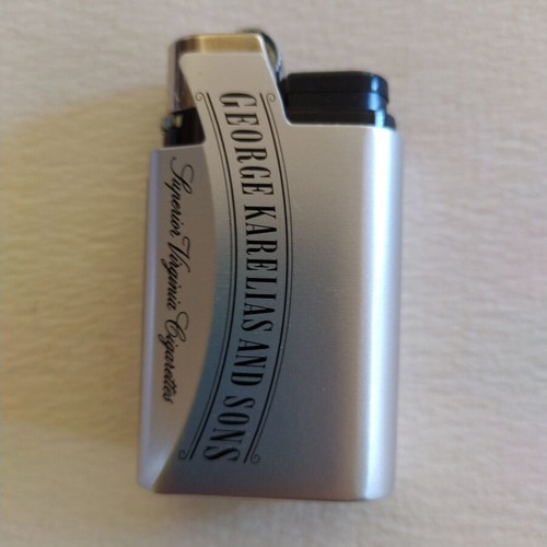 George Karelias and Sons metal promotional case with lighter new