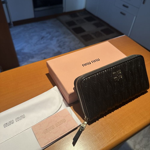 Miu Miu large black wallet like new with ample storage