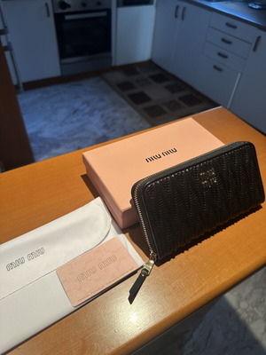 Miu Miu large black wallet like new with ample storage