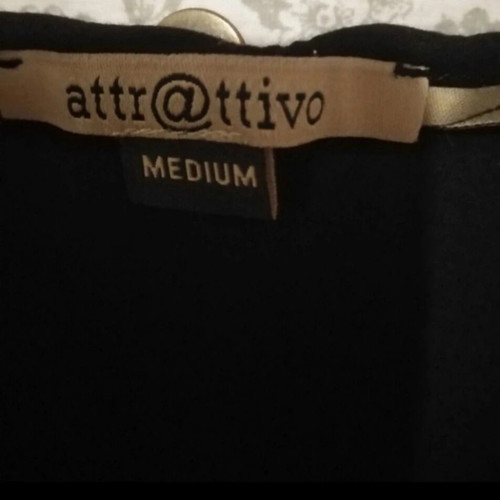 Attrattivo women's asymmetrical blouse M, like new, black and white