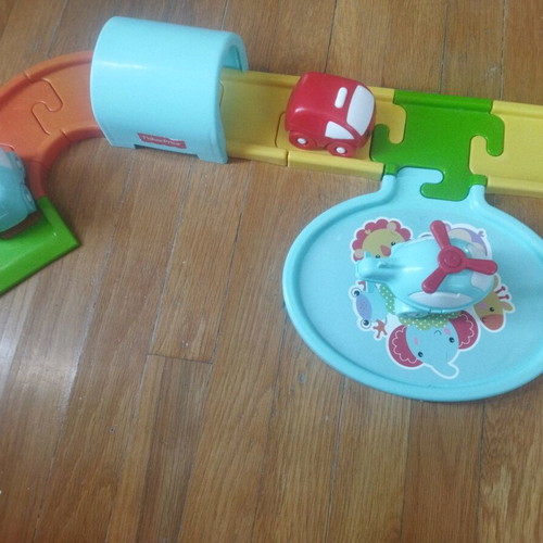 Fisher Price car track used with 2 cars and helicopter