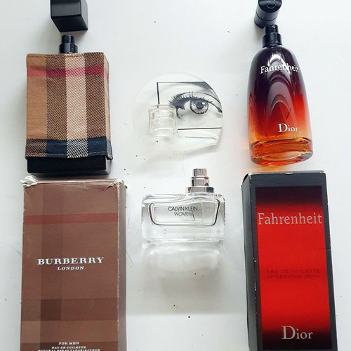 Empty Dior Fahrenheit, Calvin Klein Woman, Burberry London perfume bottles used
