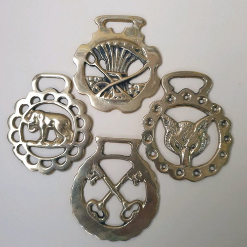 Authentic brass horse medallions set of 4 like new
