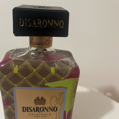 Disaronno collectible bottle used, Disaronno Wears Trussardi