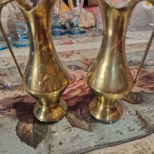 Brass pitchers set like new with carved designs and natural patina