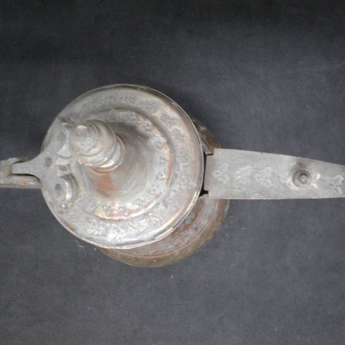 Antique copper coffee kanati used with engraved oriental designs