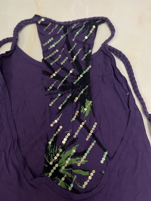 Purple shirt size small with back details like new