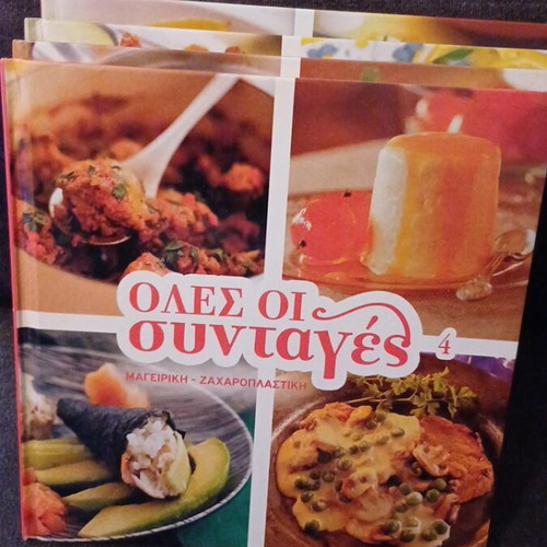 Hardcover cookbooks with recipes from around the world, like new, set of 4