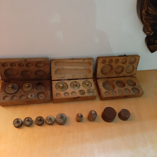 Wooden boxes with used bronze and cast iron scales set