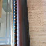 Framed mirror with embossed image like new, elegant frame
