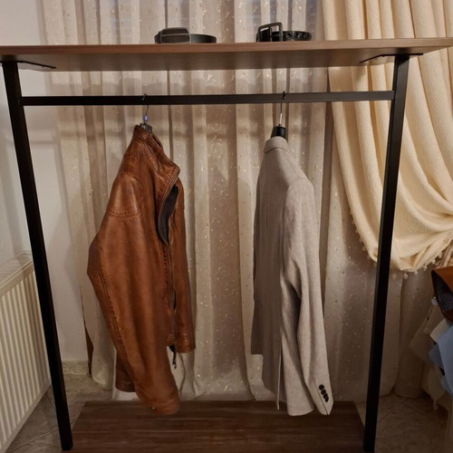 Metal wheeled clothes stand like new
