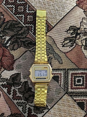 Digital watch gold color new with timer and side light