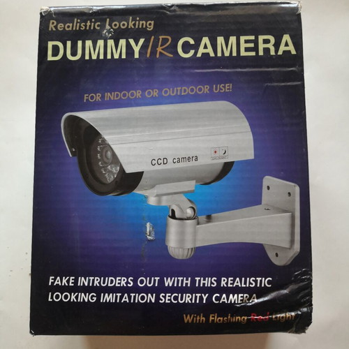 Dummy security camera with flashing red light