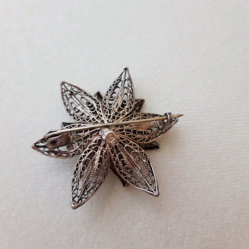 Silver filigree brooch used, flower design