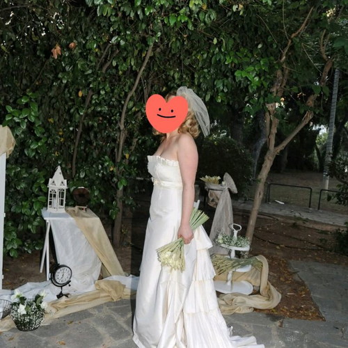Wedding dress by Viktoria Kyriakidi size medium like new, beige